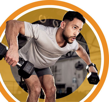 male weightlifter lifting dumbbells