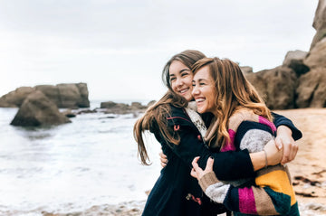 Mother and daughter on a beach