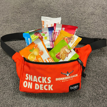 Orange Bonk Breaker "Snacks on Deck" Fanny Pack filled with Bonk Breaker products