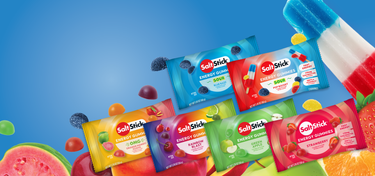 Assorted SaltStick energy gummies packaging with colorful fruit graphics on a blue background