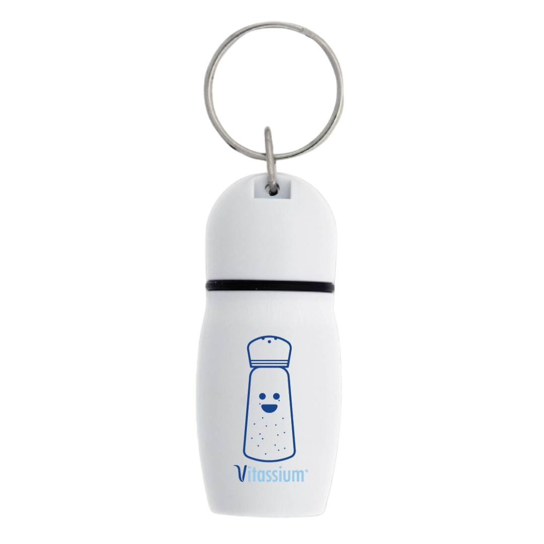 Pill holder keychain showing Dash, Vitassium mascot