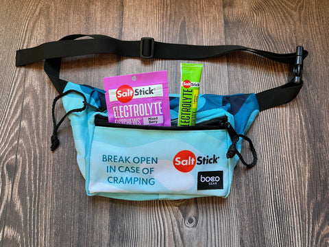 SaltStick Boco fanny pack with SaltStick Mixed Berry FastChews packet and Lemon-Lime  DrinkMix packet